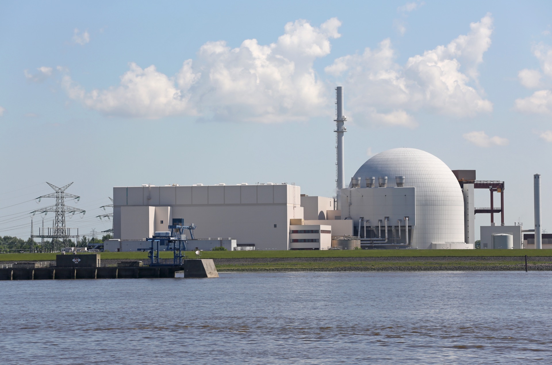 Nuclear power plant reactor containment building beside a river